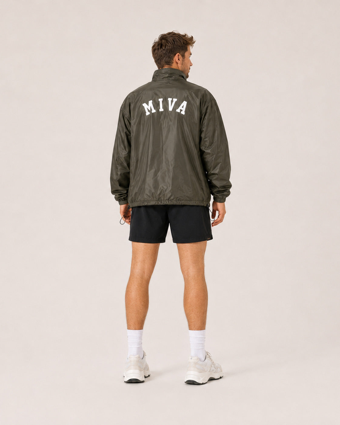 MIVA Pullover Windbreaker in Khaki, back with arched MIVA wordmark